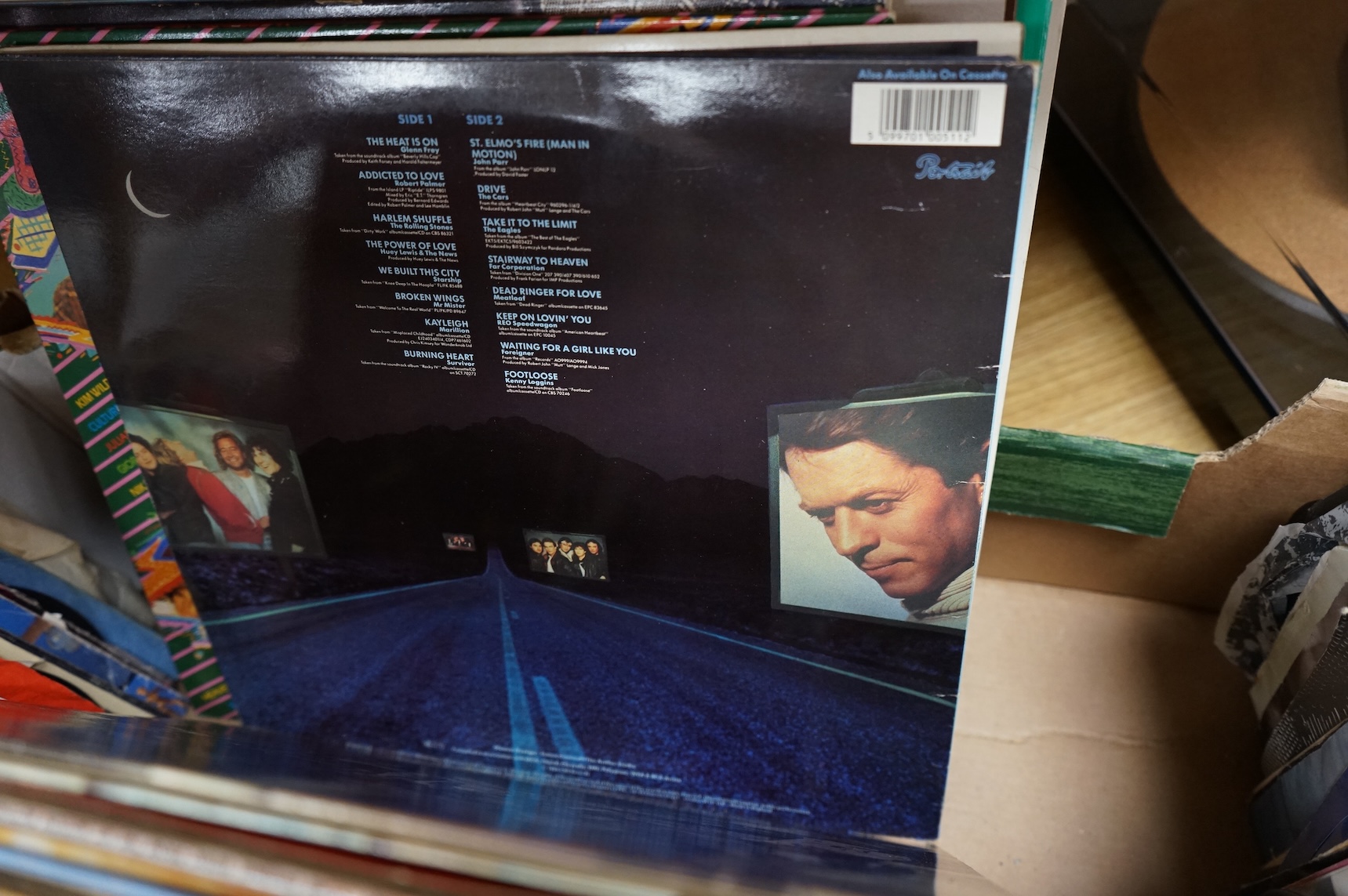 A collection of LP record albums, 12” singles and 7” singles, artists include; Dire Straits, Queen, ELO, Michael Jackson, etc.